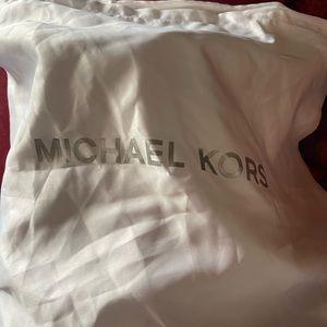 Michael Kors white sliders wore for about a month